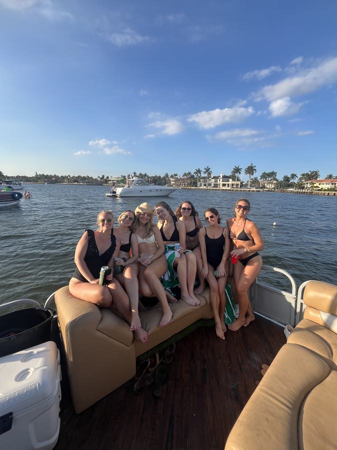 Girls group on luxury pontoon Brown Boat Fort Lauderdale Intracoastal mansion row