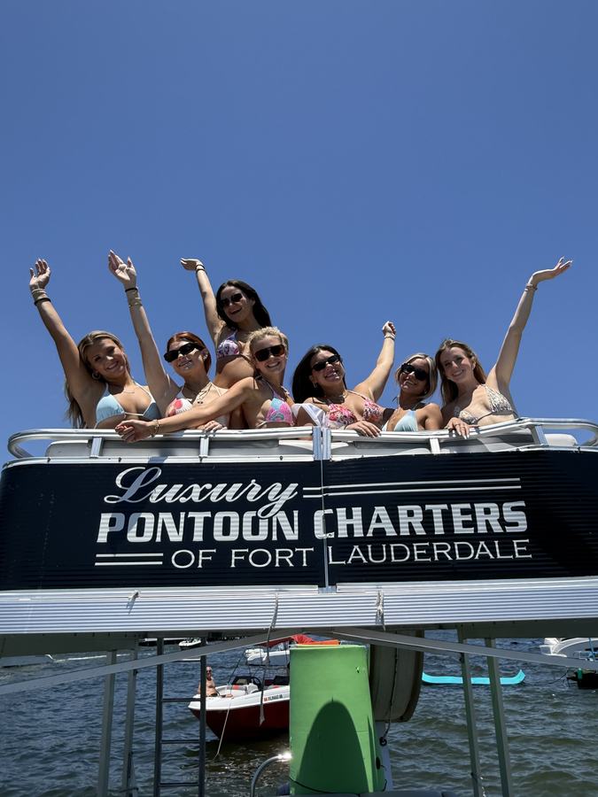 Luxury Pontoon Charters Fort Lauderdale branded sign upper deck bachelorette