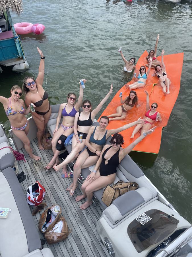 Girls party boat arms up Fort Lauderdale bachelorette charter sandbar